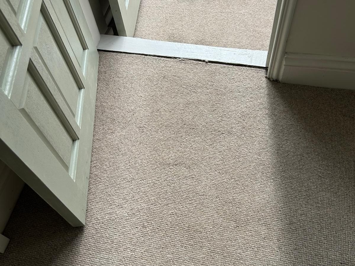 The same hallway carpet clean and even after cleaning